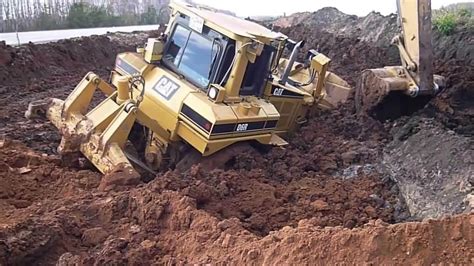 excavators stuck|bulldozer stuck in mud videos.